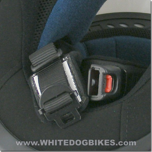 Open quick release helmet buckle close up