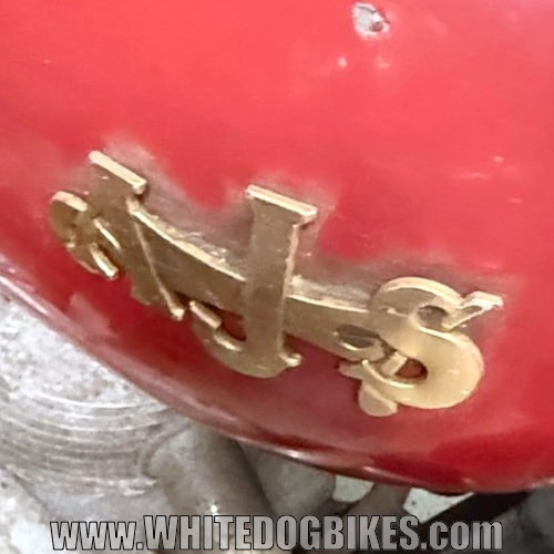 AJS badge
