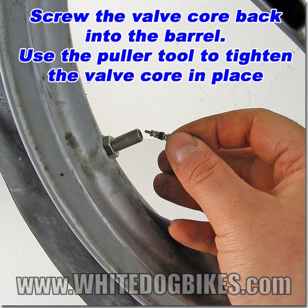 Screw the valve back into the innertube
