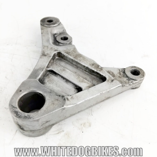 OEM Yamaha FZS600 Fazer used rear brake caliper mounting bracket in chrome