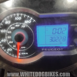 OEM Peugeot Tweet RS 125 used speedometer showing 30228 miles on the digital clocks